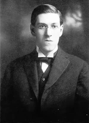 Black-and-white portrait of author H. P. Lovecraft wearing a suit and tie